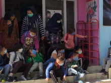 Children and teachers outside the free day center run by Catholic sisters of the association For the Children of Kabul in Kabul, Afghanistan.